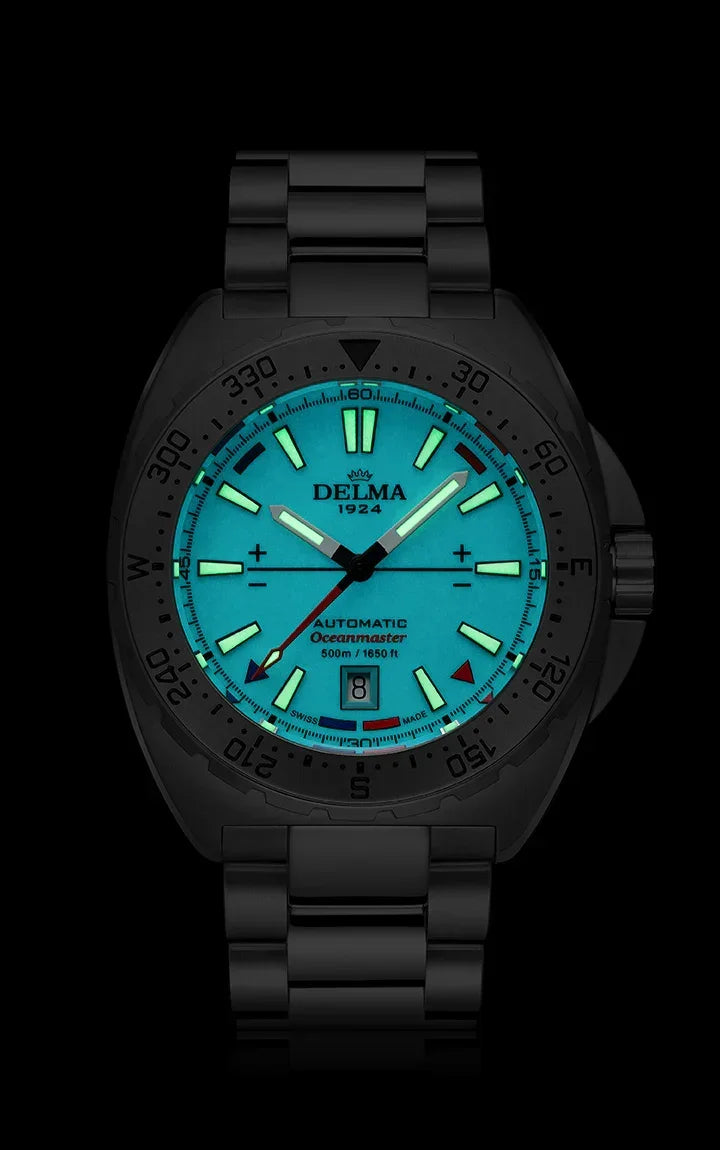 Delma Oceanmaster Lume blue dial stainless steel bracelet dark