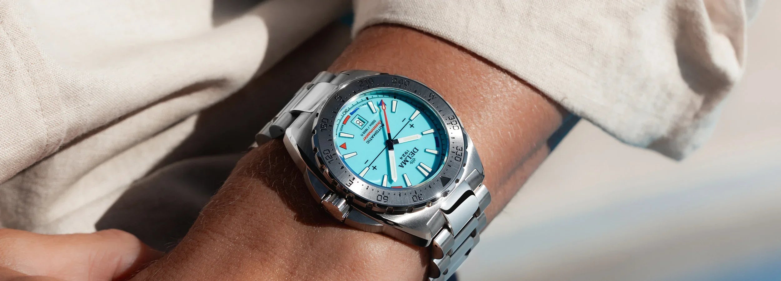 Delma Oceanmaster Lume blue dial stainless steel bracelet