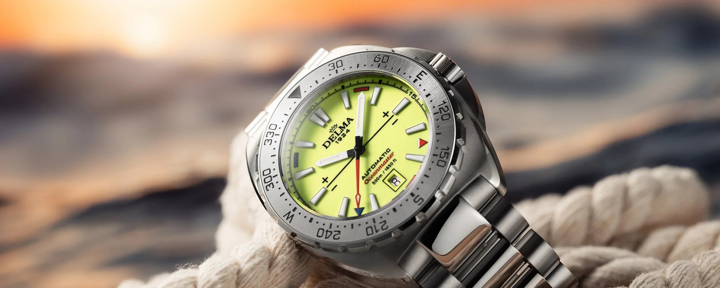 Delma Oceanmaster Lume yellow dial stainless steel bracelet