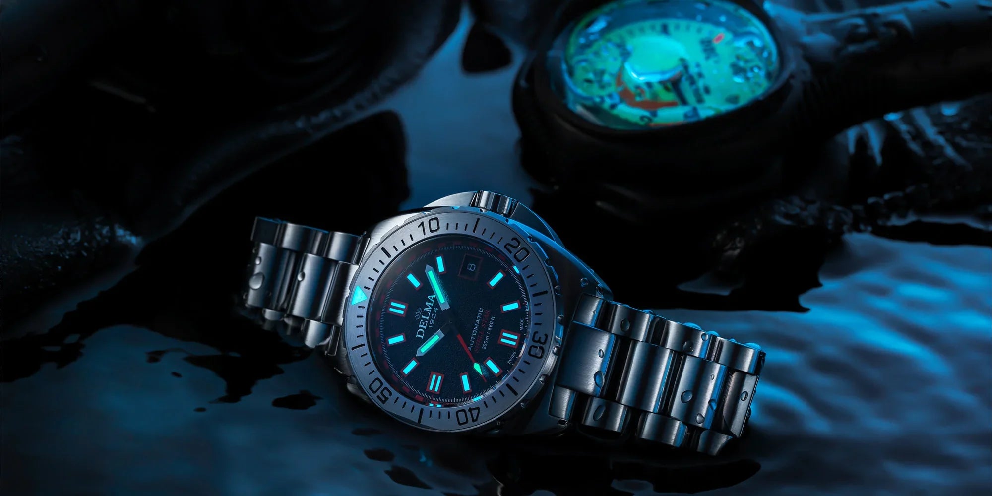 Delma Shell Star 41mm black dial stainless steel bracelet lume