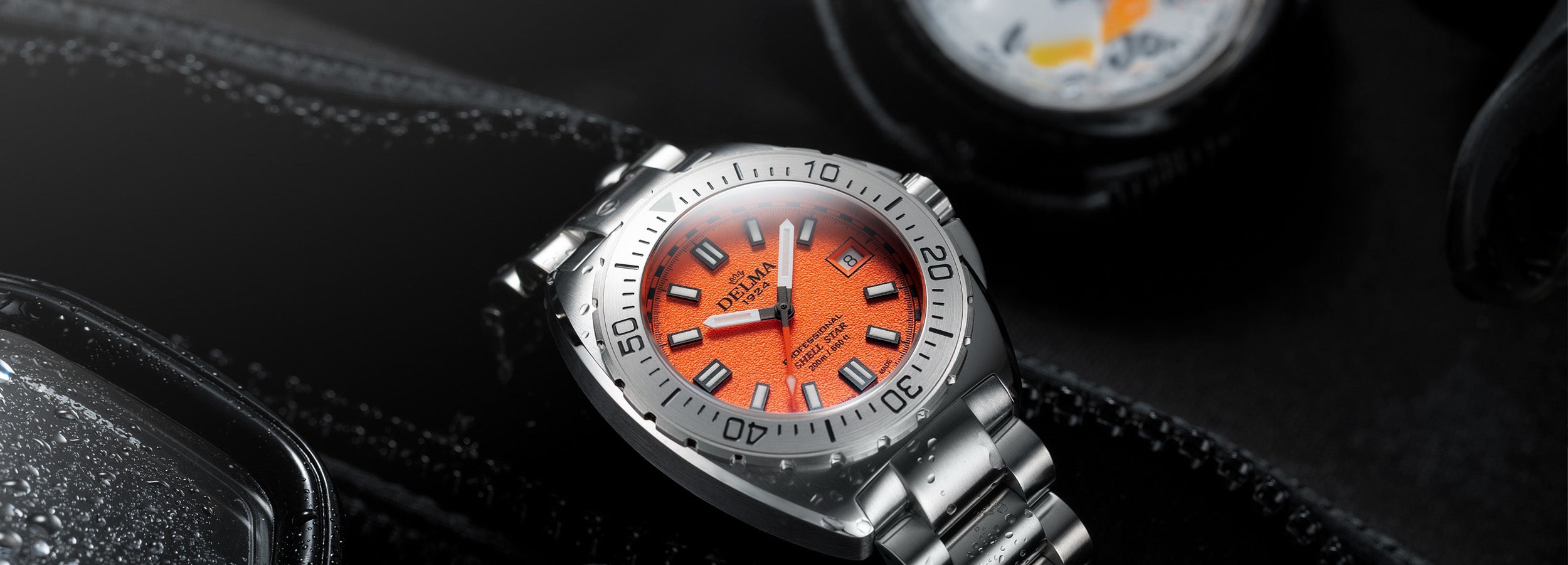 Delma Shell Star 41mm orange dial stainless steel bracelet