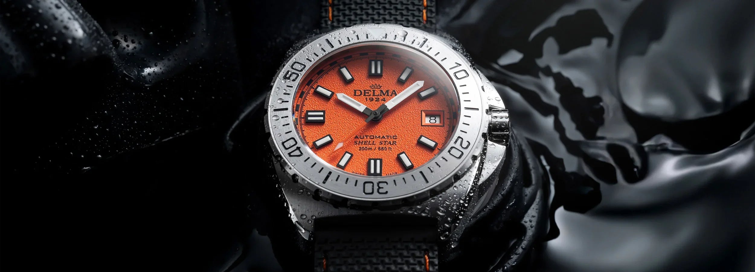 Delma Shell Star 41mm orange dial black rubber strap
