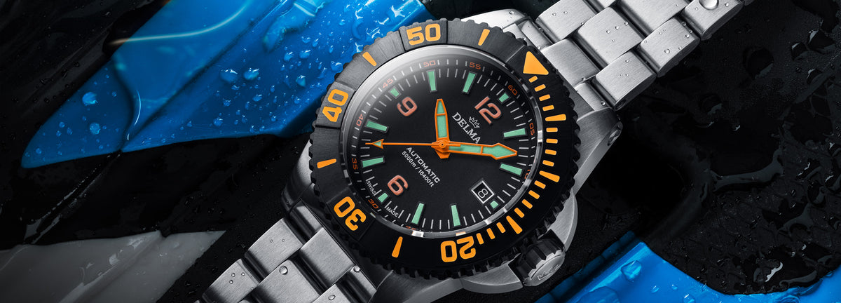 DELMA Blue Shark IV stainless steel watch with black dial and black bezel in context