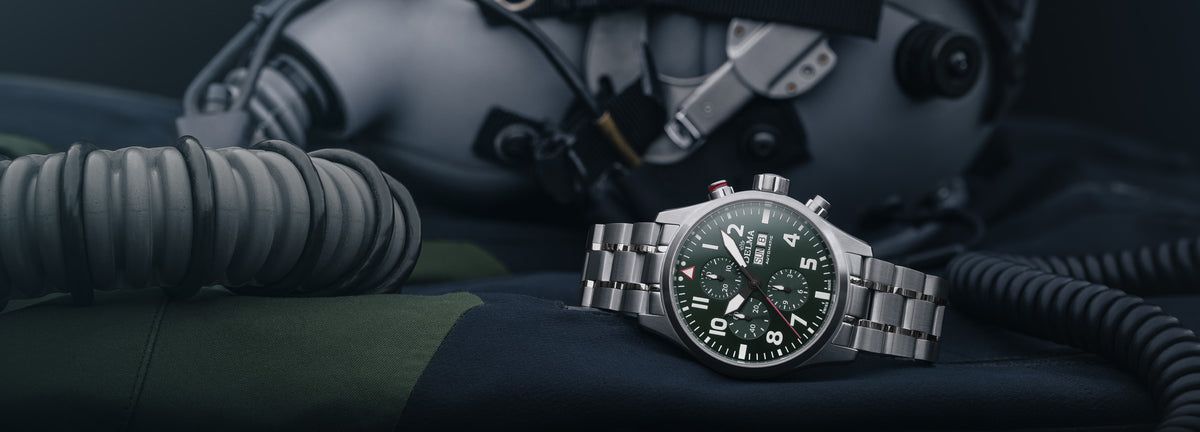 DELMA Commander Chronograph stainless steel watch with green dial in context