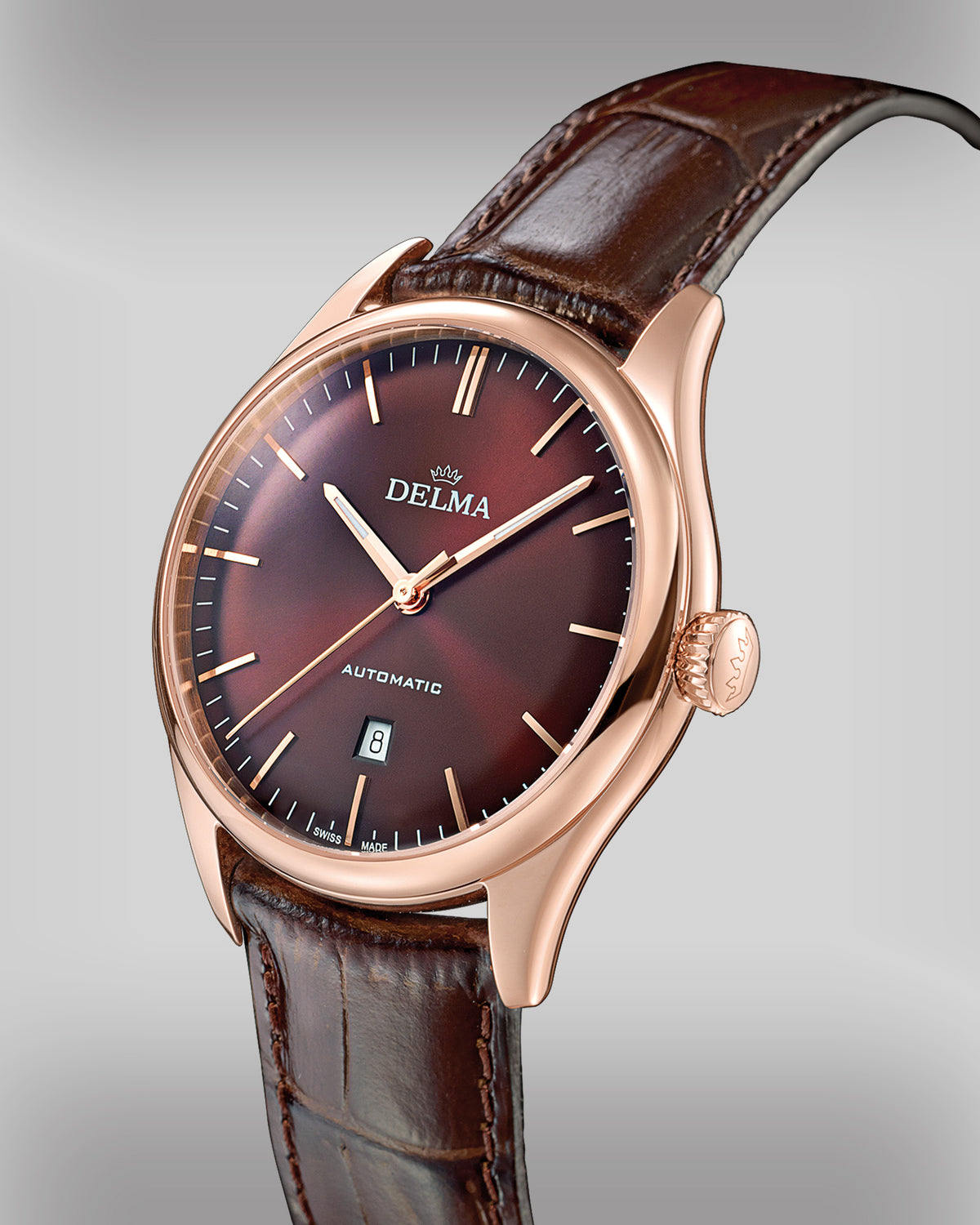 DELMA Heritage stainless steel and rose gold PVD watch with brown dial and brown leather strap side