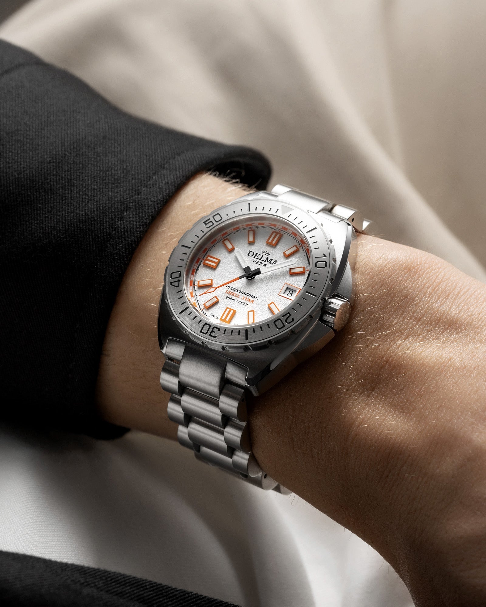 DELMA Shell Star 41 mm stainless steel watch with white dial wrist shot
