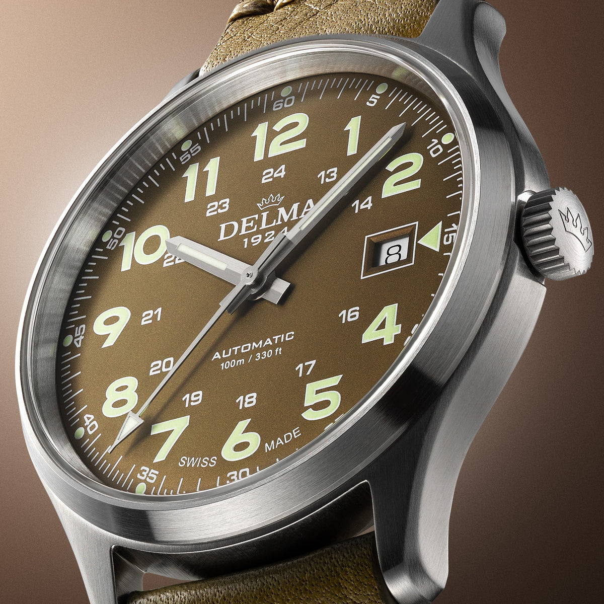 DELMA Commander 40 mm stainless steel watch with olive dial and olive leather strap side close up