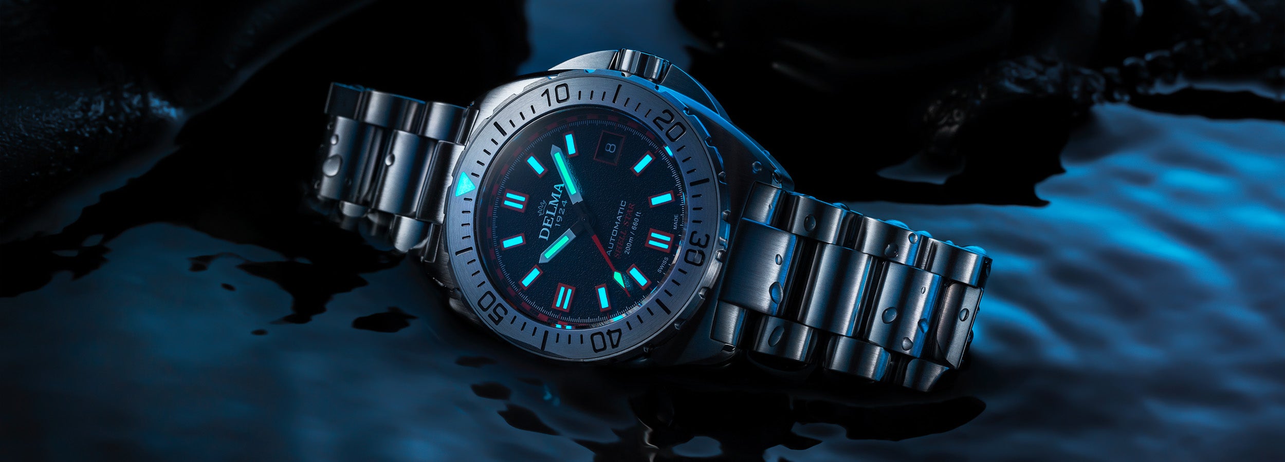 Delma Shell Star 41mm black dial stainless steel bracelet lume