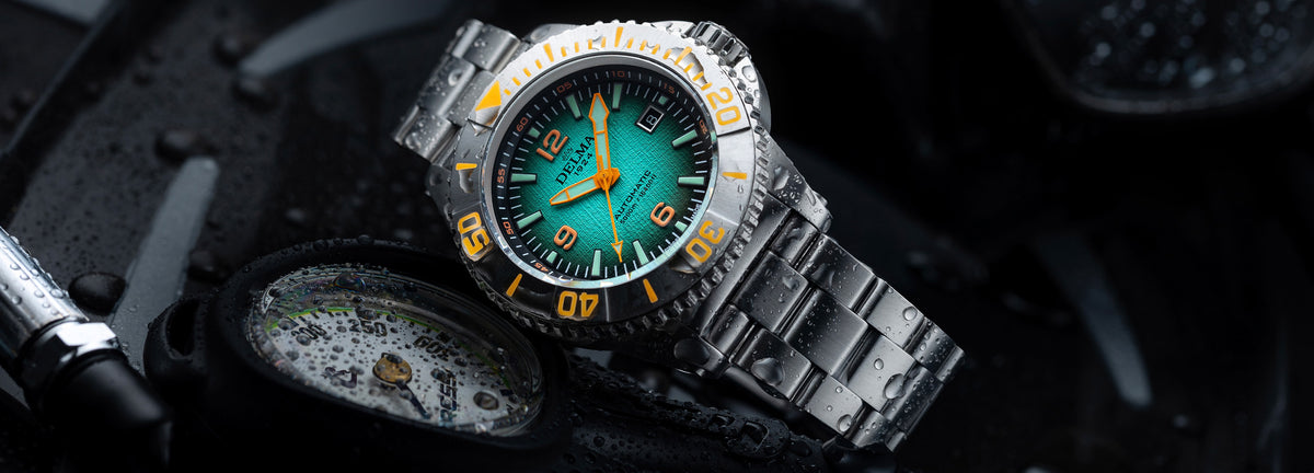 DELMA Blue Shark IV stainless steel watch with teal gradient dial in context