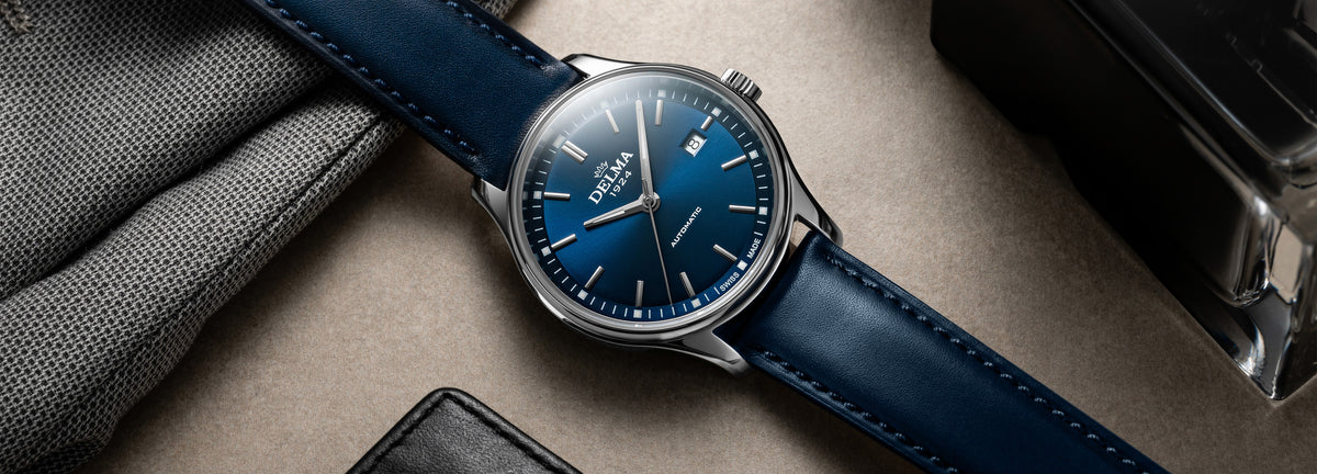 DELMA Classic stainless steel watch with blue dial and blue leather strap in context