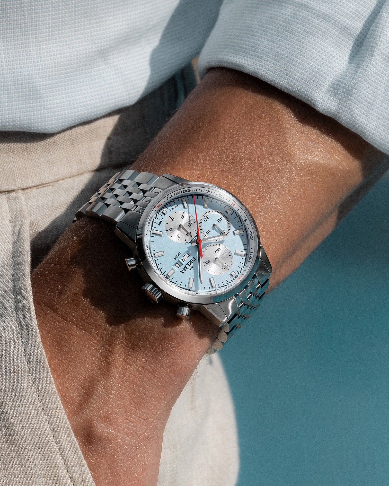 DELMA Continental Automatic stainless steel watch with light blue dial wrist shot