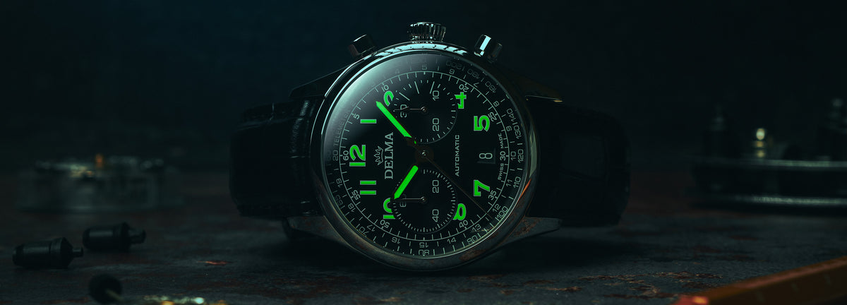 DELMA Heritage Chronograph LE stainless steel watch with black dial and black leather strap lume in context
