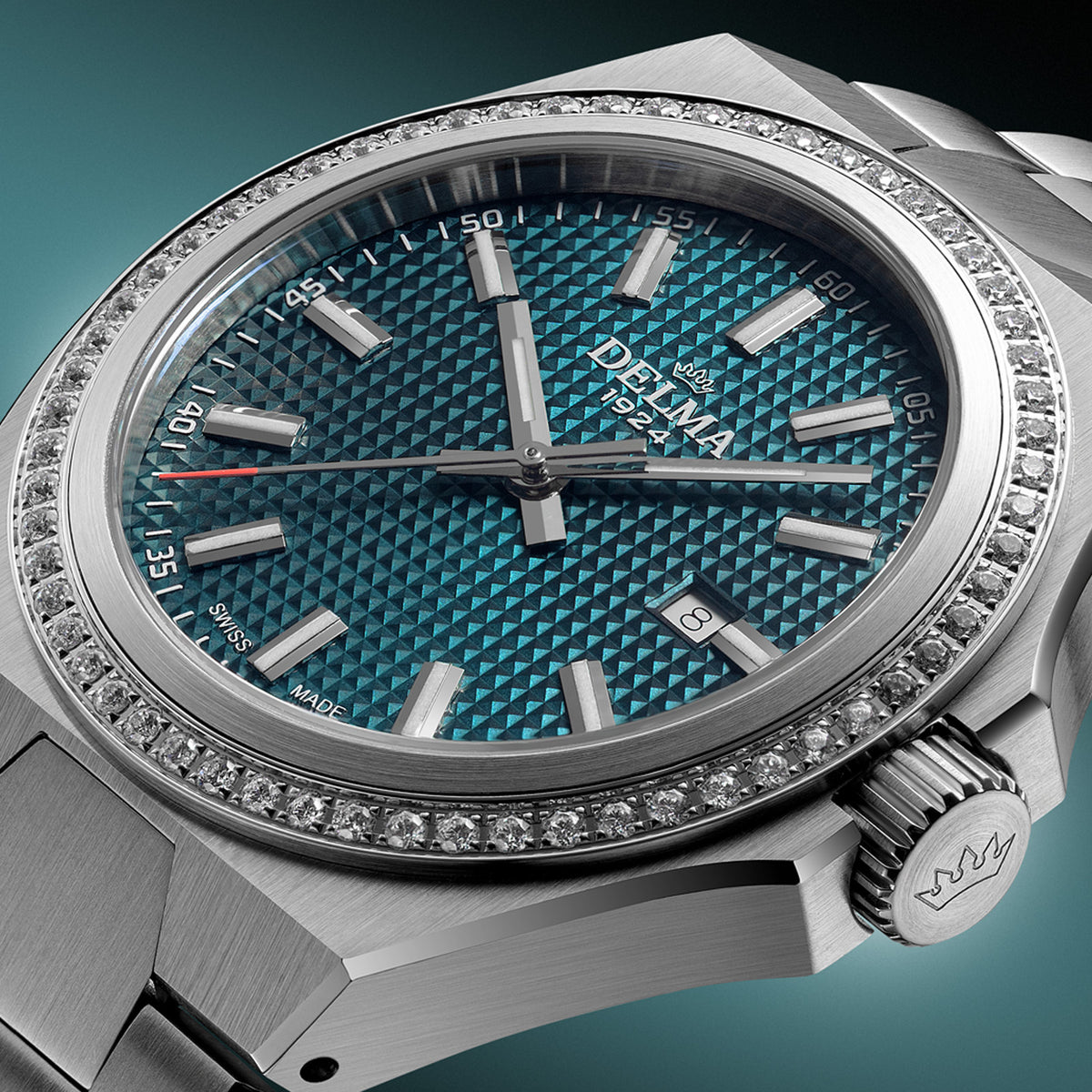 DELMA Midland 34 mm stainless steel watch with teal dial and diamond bezel close up