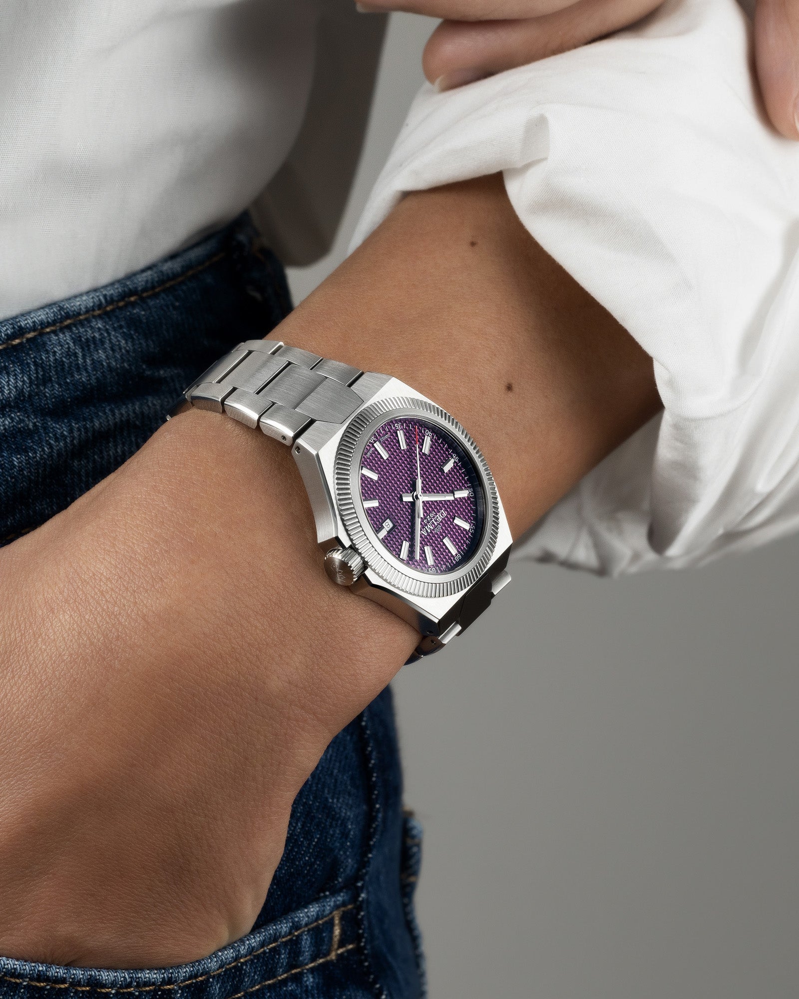 DELMA Midland 34 mm stainless steel watch with purple dial on wrsit