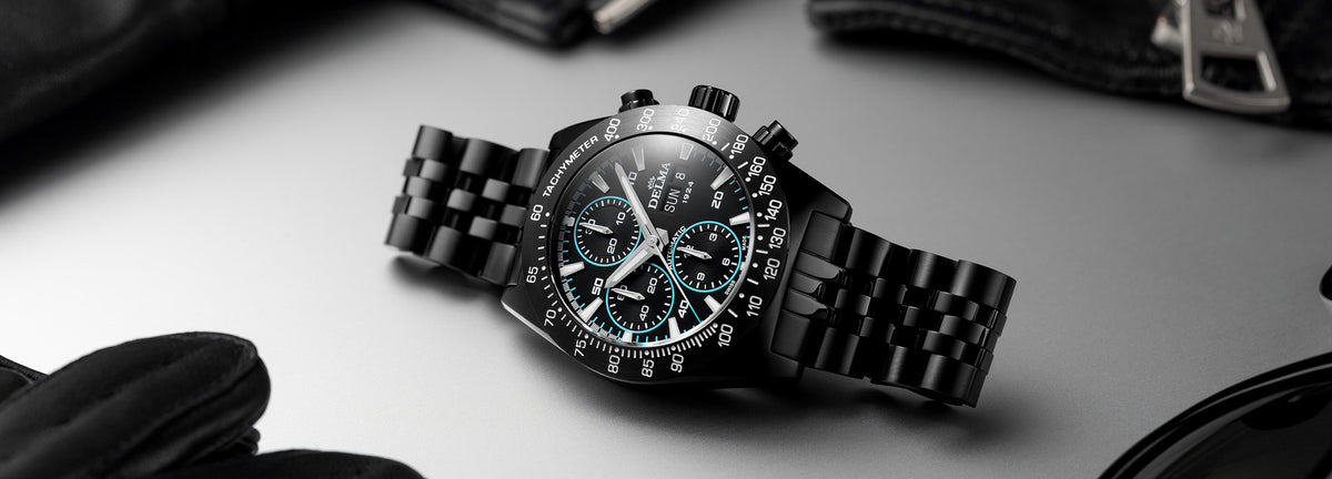 DELMA Montego Black Edition black DLC stainless steel watch with black dial and blue accents in context