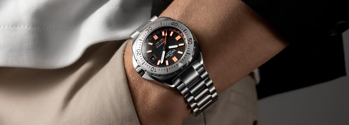 DELMA Shell Star 41 mm Automatic stainless steel watch with black dial on wrist